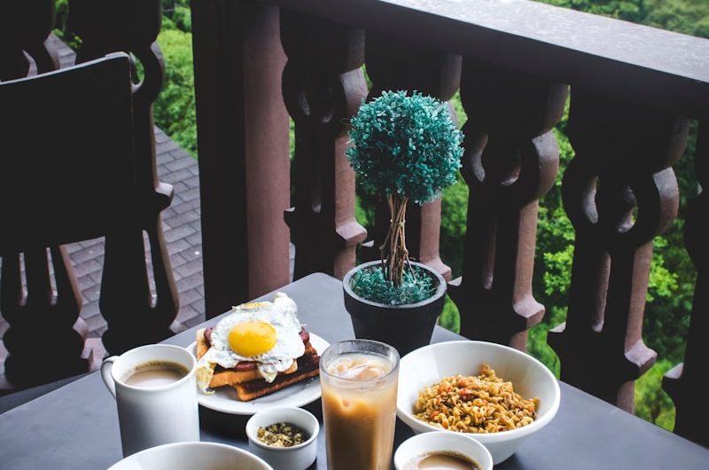 breakfast placed on table at terrace