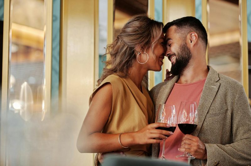 Portrait of Couple Drinking Wine